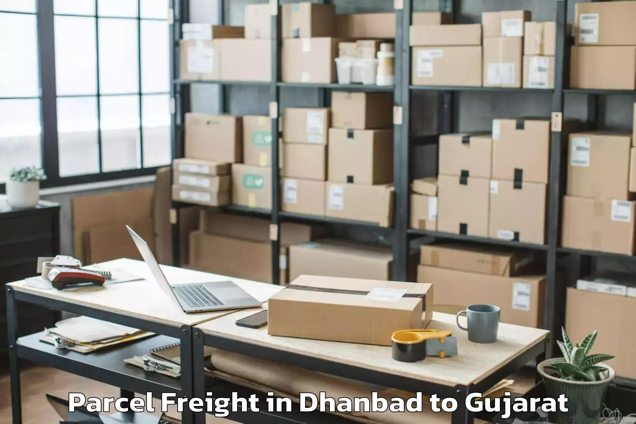 Expert Dhanbad to Kamrej Parcel Freight